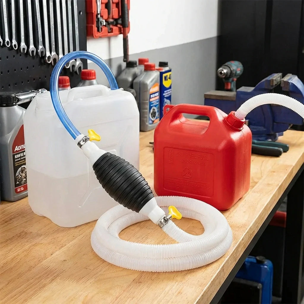 Portable fuel transfer pump with white reservoir, blue suction hose, black discharge hose