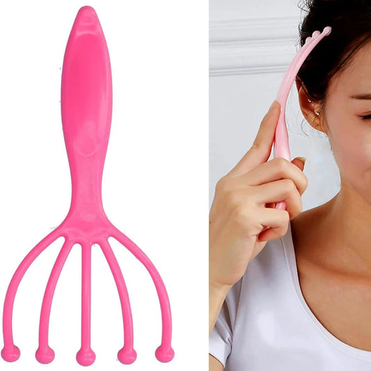 Pink silicone scalp ball massager with curved handle and five flexible prongs