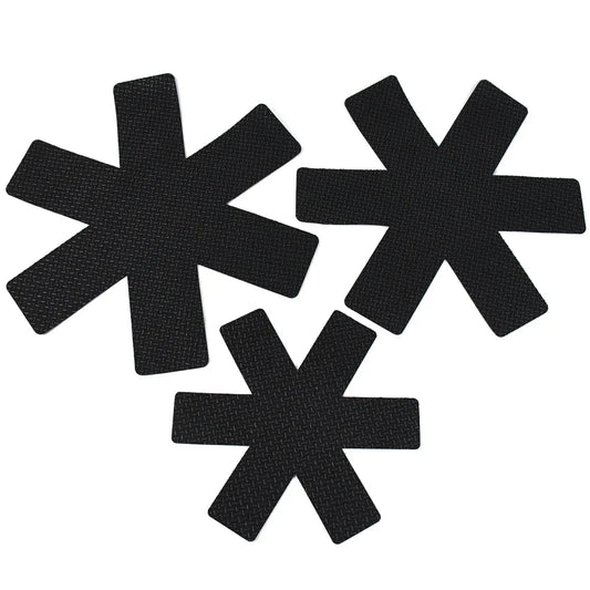 Set of three black, star-shaped pot and pan protectors