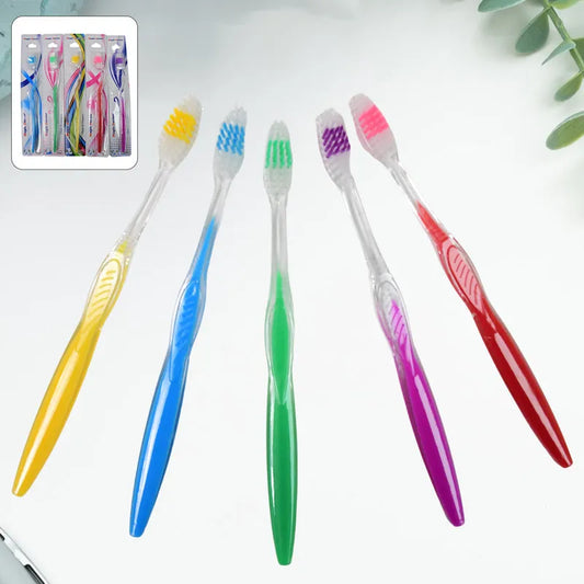 Soft plastic toothbrushes with colored handles and small bristle heads