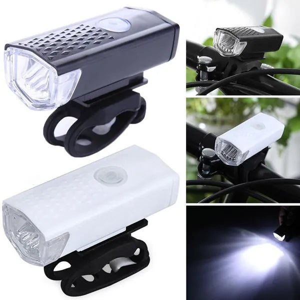 Rechargeable bicycle light set: black housing front lamp and bright white light output.