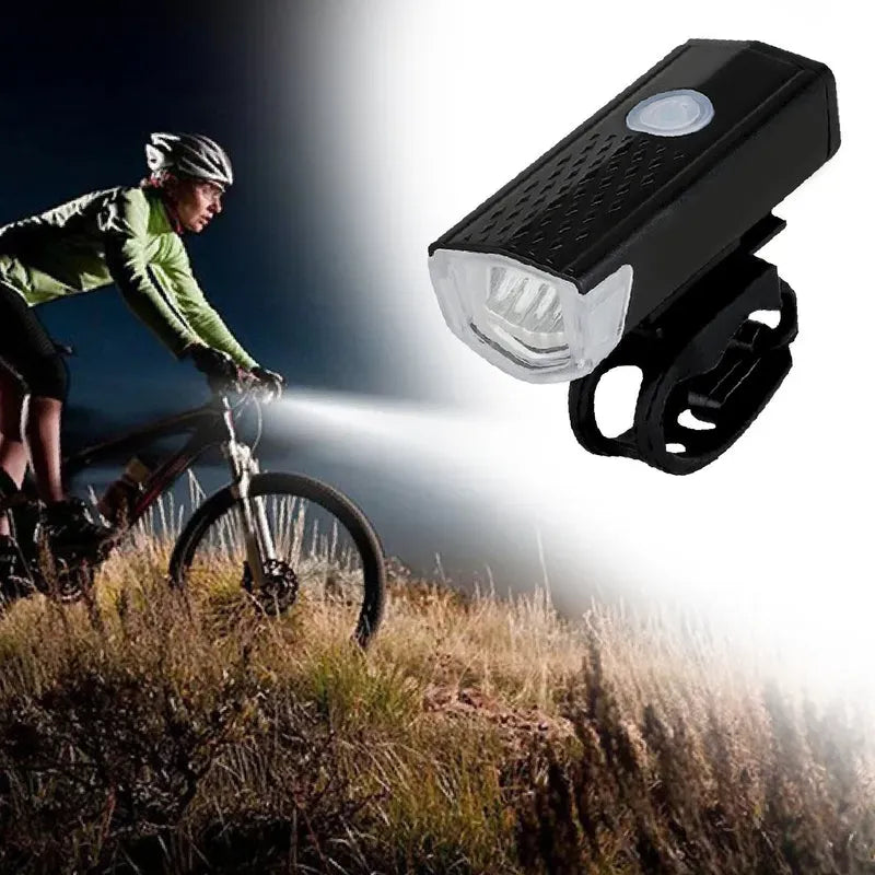 Rechargeable bicycle light on bike front, bright white beam with black mounting.