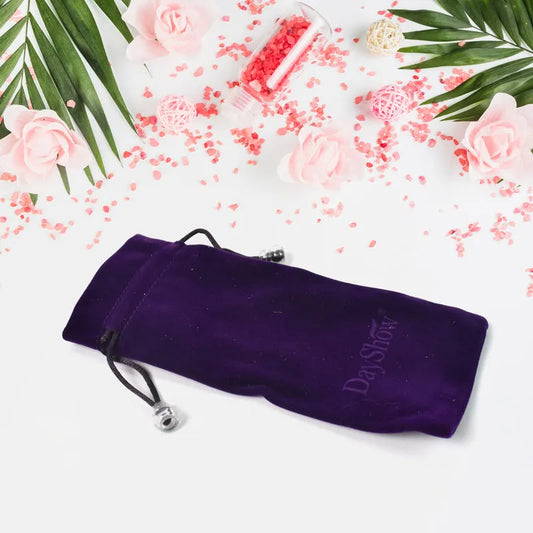 Purple velvet drawstring gift bag with metal grommet and embossed 'Daisy'