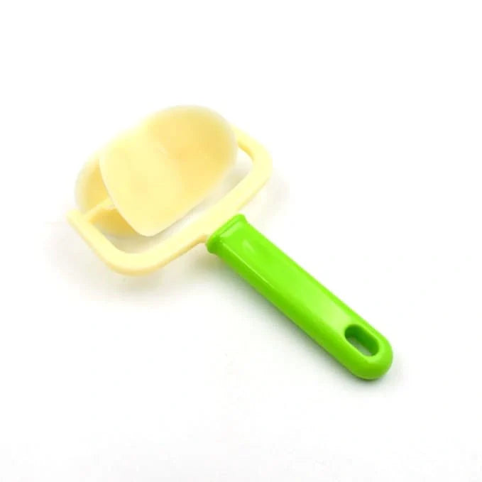 Round dough cutter roller with green handle and yellow round cutting wheel
