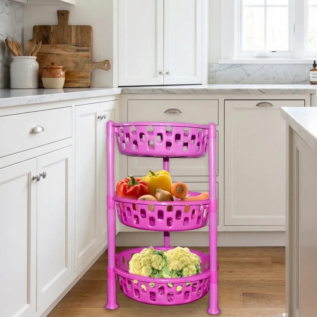 Purple 3-tier round plastic rack organizer with three vented baskets filled with produce.
