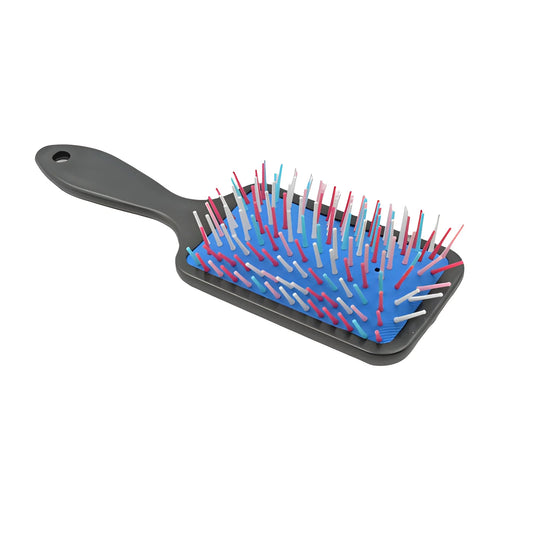 Scalp massage detangling comb with blue and pink flexible bristles on cushion pad