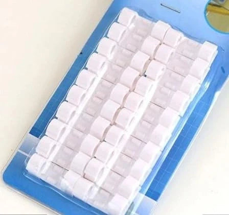 Adhesive cable clips blister pack with multiple white clips