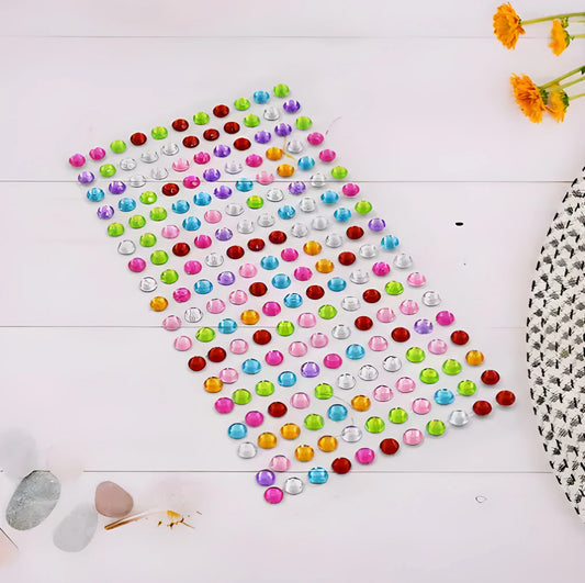 Crystal sticker sheet with multicolor round gem dots and a silver backing