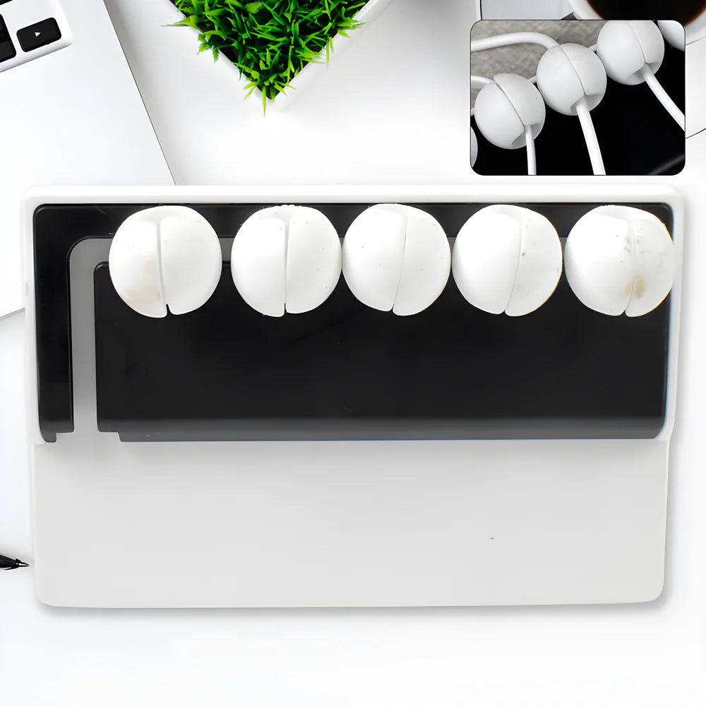 Silicone cable organizer clips, five white round clips on a cable management strip