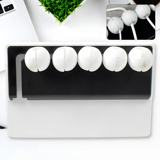 Silicone cable organizer clips, five white round clips on a cable management strip