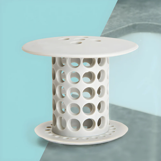 White silicone drain hair catcher with circular perforations and base
