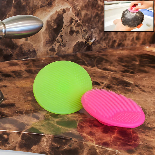 Silicone face brush heads, one green and one pink with textured bristles