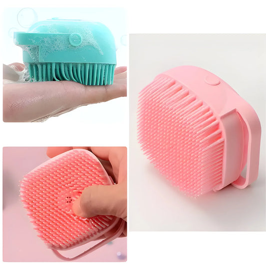 Silicone soap-dispensing bath brush in pink with circular scrub head and easy grip handle