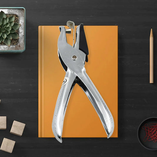 Single hole paper punch with silver metal body and lever handles