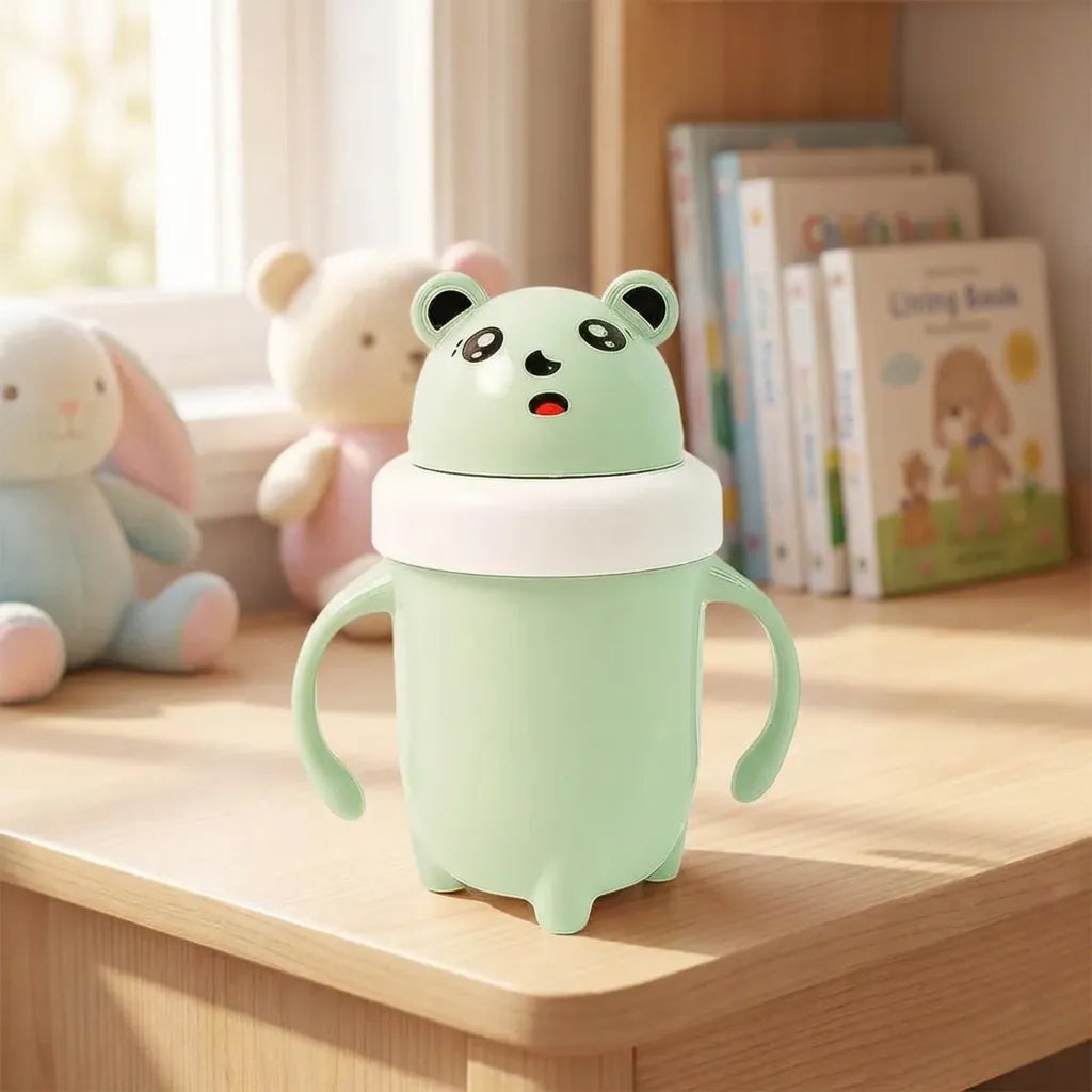 Light green panda-themed baby sipper cup with flip-top lid and side handles.