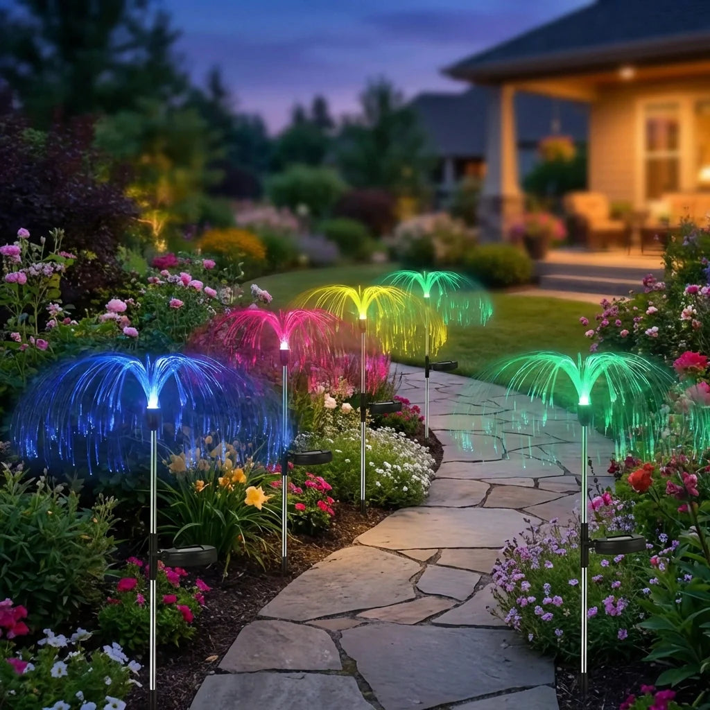 Solar jellyfish garden lights with multicolor glowing tentacles on stake