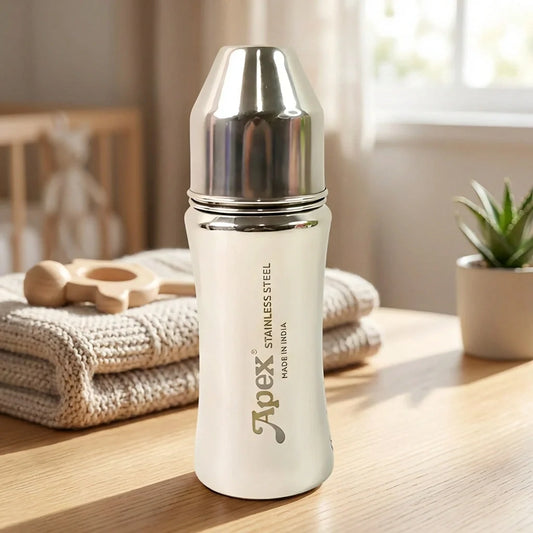 Stainless steel baby feeding bottle with shiny metal cap and white body