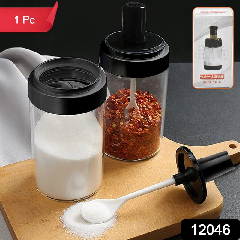 Stainless steel oil sprayer with clear bottle, black pump top and spout
