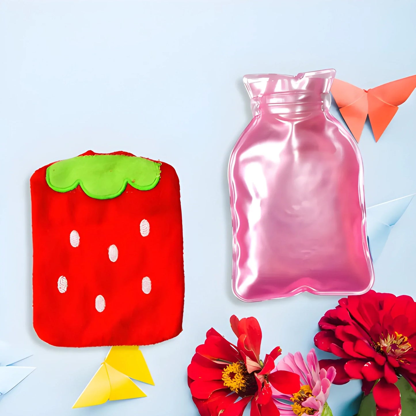 Strawberry hot water bag: red plush cover with green leaves, with pink rubber insert