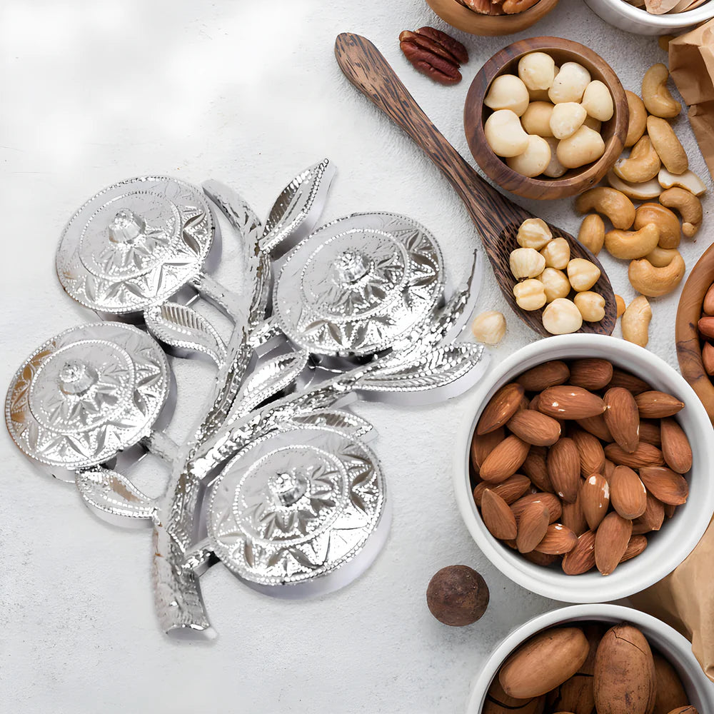 Silver tree-shaped serving tray with four round decorative insets