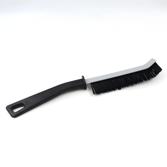 Gap cleaning brush with black bristle head and ergonomic black handle