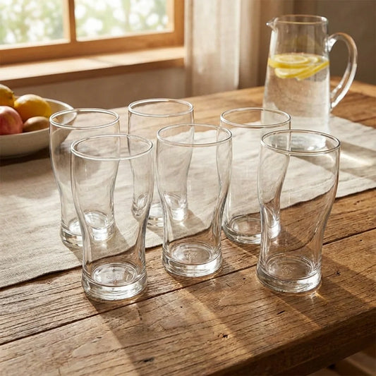 Unbreakable tumbler set with clear glass cups, including a matching pitcher.