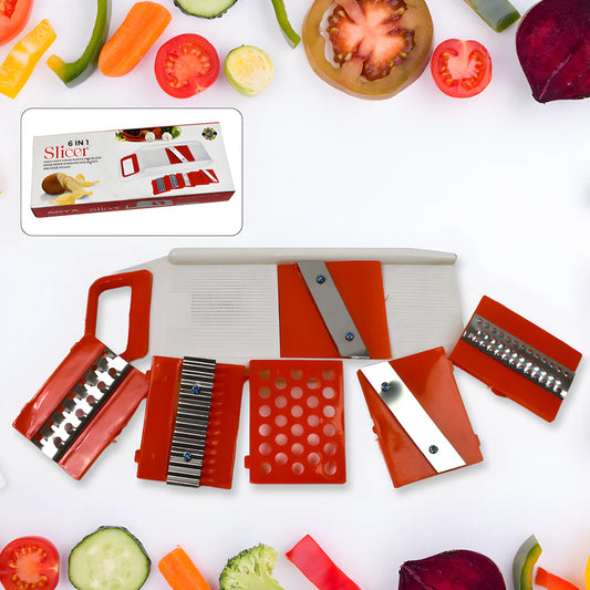 Vegetable slicer cutter set with red base, orange blades, and multiple slicing attachments