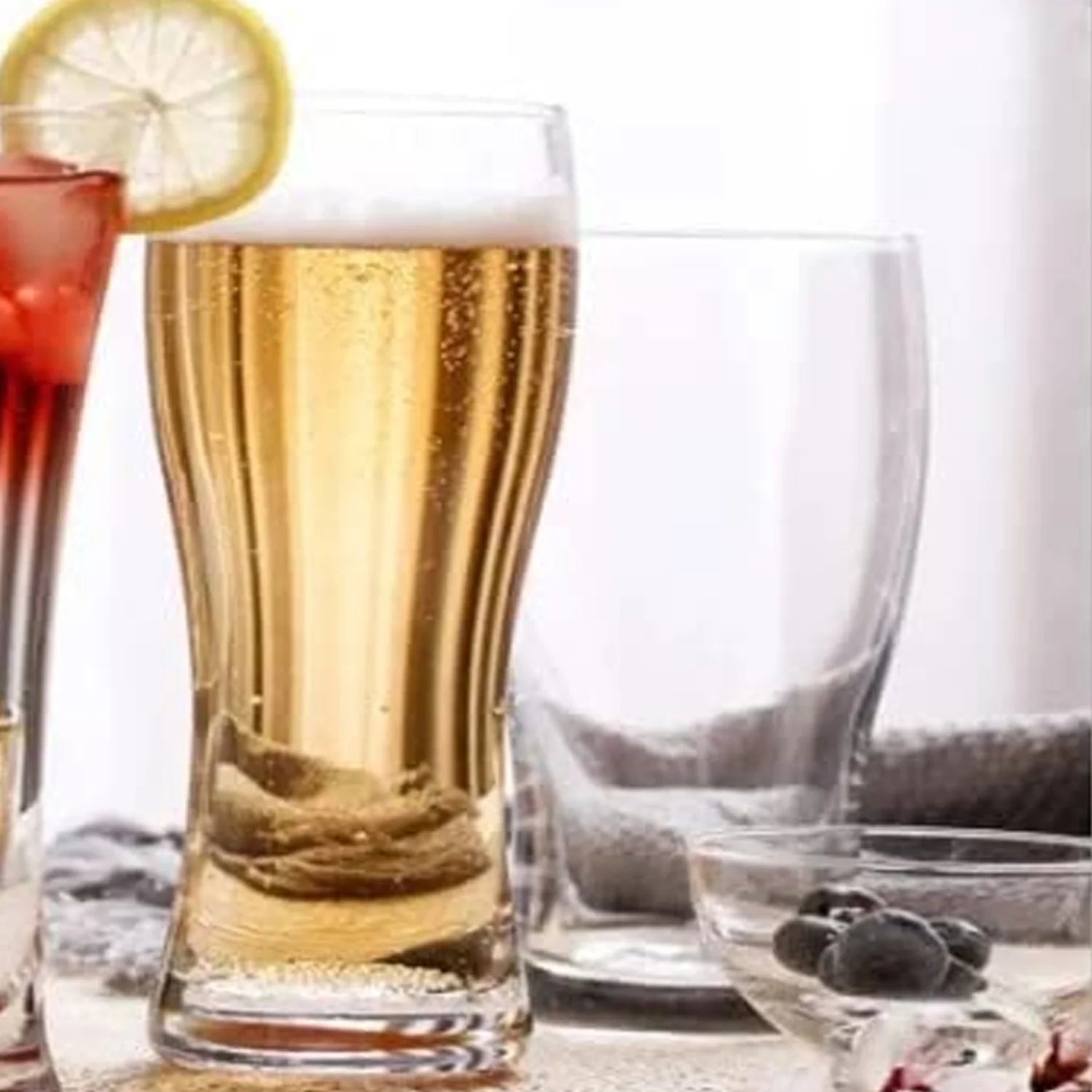 Unbreakable glass set, two clear tumblers with amber drink