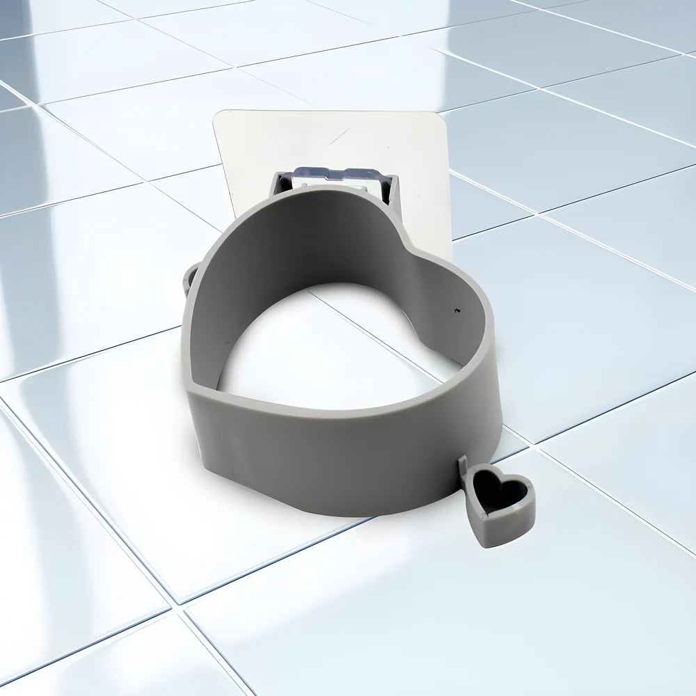 Wall-mounted dryer holder with cradle and small accessory hook