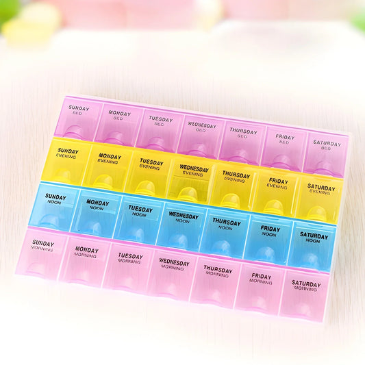 Weekly pill organizer box with 7-day compartments labeled Sunday to Saturday