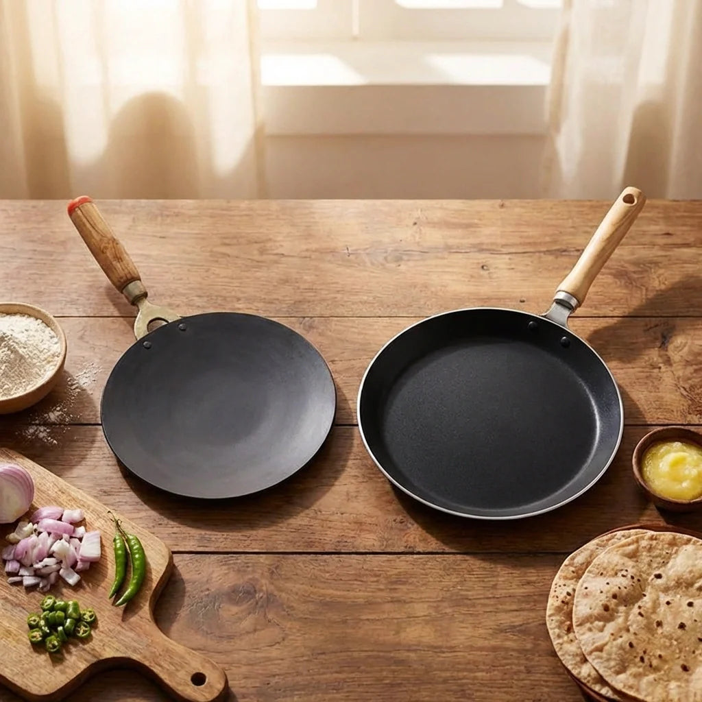 Two round roti tawa skillets with light wood handles and black cooking surfaces.