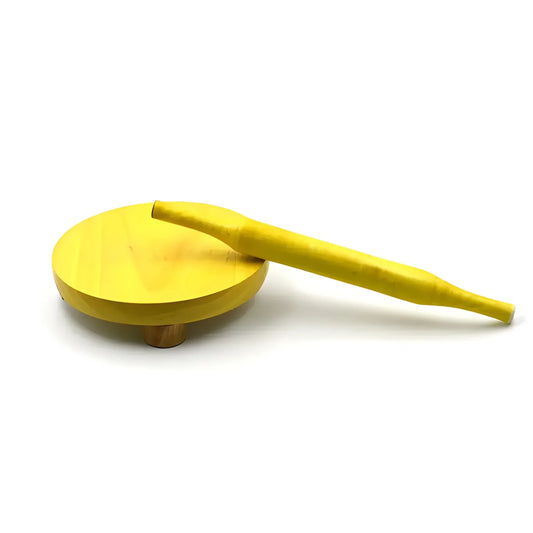 Wooden roti press with yellow handle and round base