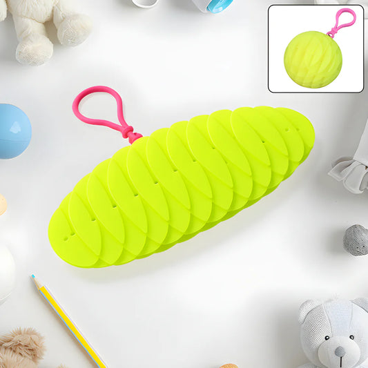 Neon green segmented worm fidget toy with pink loop handle
